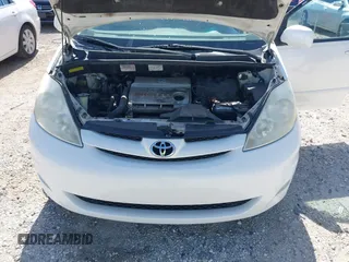 2006 Toyota Sienna XLE with VIN 5TDZA22C06S576958, listed as a IAAI auction lot 41978892 with 257,598 mi miles. Bid and sale history available at carsss.com. Image 10.
