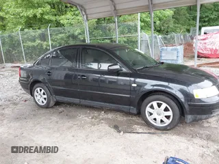 1999 Volkswagen Passat GL z VIN WVWMD63B2XE351611, wystawiony jako IAAI lot #42308007 z przebiegiem 180 893 mil mil oraz . Historia ofert i sprzedaży dostępna na DreamBid. Obrazek 13.