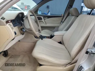 1998 Mercedes-Benz E-Class with VIN WDBJH65F7WA546101, listed as a Copart auction lot 47098945 with 227,453 mi miles and Salvage Title. Bid and sale history available at carsss.com. Image 7.