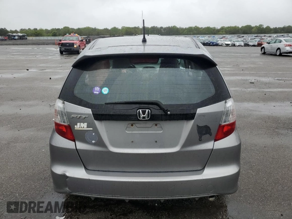 2010 Honda Fit Sport with VIN JHMGE8H40AC017384, listed as a Copart auction lot 58226445 with 138,453 mi miles and Salvage title. Bid and sale history available at DreamBid. Image 6.