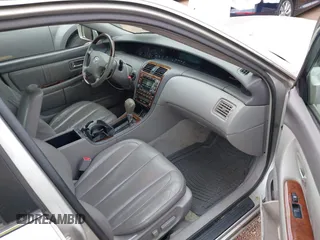 2003 Toyota Avalon XL with VIN 4T1BF28B33U329115, listed as a IAAI auction lot 41015769 with 166,726 mi miles and . Bid and sale history available at carsss.com. Image 5.