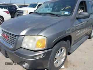 2006 GMC Envoy SLT with VIN 1GKDS13S462185122, listed as a IAAI auction lot 41778816 with 220,974 mi miles. Bid and sale history available at carsss.com. Image 6.