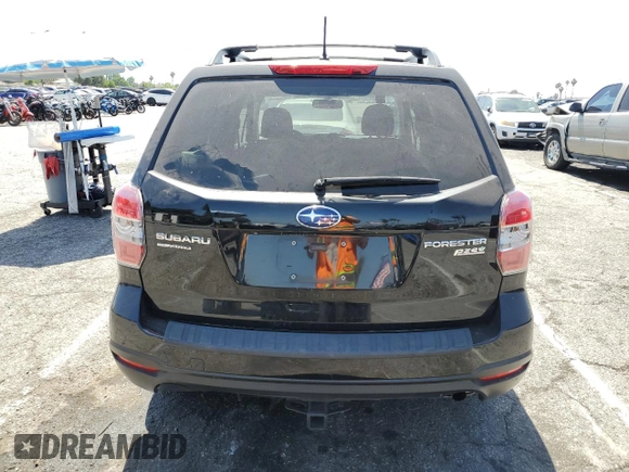 2014 Subaru Forester Premium with VIN JF2SJAEC0EH526895, listed as a Copart auction lot 58445005 with 131,186 mi miles and Salvage title. Bid and sale history available at DreamBid. Image 6.