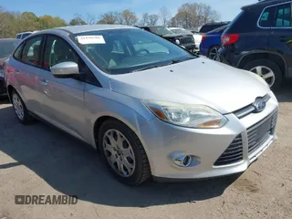 2012 Ford Focus SE with VIN 1FAHP3F29CL377721, listed as a IAAI auction lot 41848786 with 147,709 mi miles. Bid and sale history available at carsss.com. Image 1.