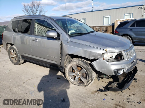 2016 Jeep Compass Latitude with VIN 1C4NJDEB2GD697923, listed as a Copart auction lot 84081394 with 167,240 mi miles and Salvage Title. Bid and sale history available at carsss.com. Image 4.