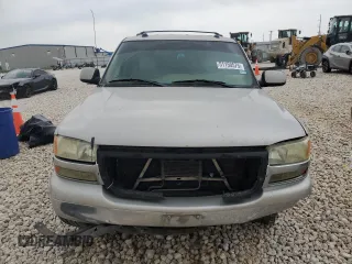 2004 GMC Yukon SLT with VIN 1GKEC13Z34R313210, listed as a Copart auction lot 51150575 with 328,961 mi miles and Salvage Title. Bid and sale history available at carsss.com. Image 5.