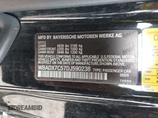 2013 BMW 3 Series 335i with VIN WBADX7C57DJ590238, listed as a IAAI auction lot 41920557 with 160,946 mi miles and . Bid and sale history available at DreamBid. Image 9.