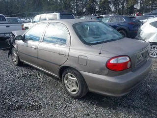 2001 Kia Sephia z VIN KNAFB121815046919, wystawiony jako IAAI lot #41398257 z przebiegiem 191 818 mil mil oraz . Historia ofert i sprzedaży dostępna na DreamBid. Obrazek 3.