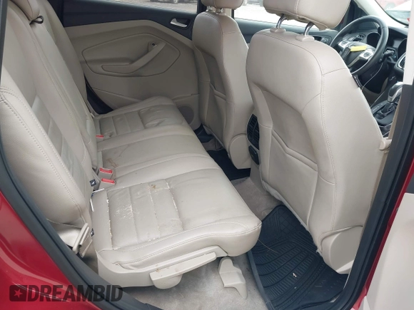 2016 Ford Escape Titanium with VIN 1FMCU9JX2GUA89716, listed as a IAAI auction lot 41899786 with 85,474 mi miles and . Bid and sale history available at DreamBid. Image 8.