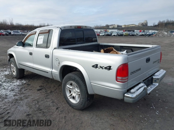 2004 Dodge Dakota SLT with VIN 1D7HG48N04S603763, listed as a IAAI auction lot 41607984 with 157,360 mi miles. Bid and sale history available at carsss.com. Image 3.
