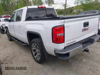 2016 GMC Sierra 1500 SLE z VIN 3GTU2MEC6GG227933, wystawiony jako IAAI lot #42026651 z przebiegiem 185 043 mil mil oraz . Historia ofert i sprzedaży dostępna na DreamBid. Obrazek 3.