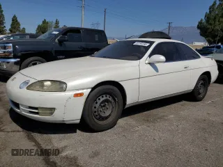 1996 Lexus SC 400 with VIN JT8CH32Y0T0051222, listed as a Copart auction lot 65195245 with 138,876 mi miles and Salvage title. Bid and sale history available at DreamBid. Image 1.