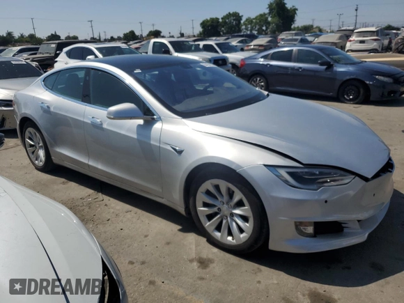 2017 Tesla Model S 60 with VIN 5YJSA1E17HF189627, listed as a Copart auction lot 64454635 with 106,003 mi miles and Salvage title. Bid and sale history available at DreamBid. Image 4.