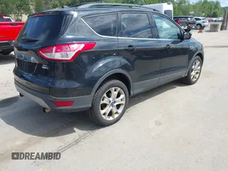 2013 Ford Escape SEL with VIN 1FMCU9HX5DUC90186, listed as a IAAI auction lot 42650691 with 151,009 mi miles and . Bid and sale history available at DreamBid. Image 4.