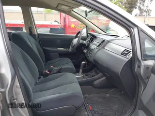 2011 Nissan Versa 1.8 S with VIN 3N1BC1AP0BL461824, listed as a IAAI auction lot 42076994 with 180,798 mi miles. Bid and sale history available at carsss.com. Image 5.