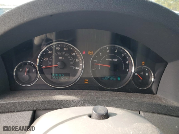 2007 Jeep Grand Cherokee Laredo with VIN 1J8HS48P57C697382, listed as a Copart auction lot 87682865 with 154,732 mi miles and Salvage Title. Bid and sale history available at carsss.com. Image 9.