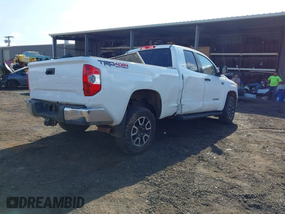2014 Toyota Tundra 4WD Truck SR with VIN 5TFUY5F1XEX385475, listed as a IAAI auction lot 41563188 with 135,310 mi miles. Bid and sale history available at carsss.com. Image 4.