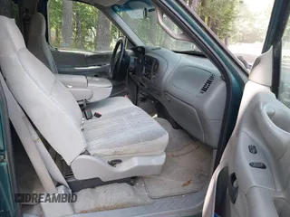 1998 Ford F-150 XL with VIN 1FTRX17L2WNA14048, listed as a IAAI auction lot 42647951 with 217,874 mi miles and . Bid and sale history available at DreamBid. Image 5.