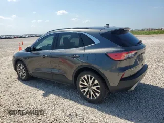 2020 Ford Escape Titanium Hybrid z VIN 1FMCU0DZ1LUC38345, wystawiony jako Copart lot #59628985 z przebiegiem 86 917 mil mil oraz Szkoda całkowita • Salvage title. Historia ofert i sprzedaży dostępna na DreamBid. Obrazek 2.