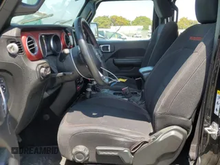 2018 Jeep Wrangler Unlimited Rubicon with VIN 1C4HJXFG1JW125326, listed as a Copart auction lot 62655395 with 33,920 mi miles and Clean title. Bid and sale history available at DreamBid. Image 7.