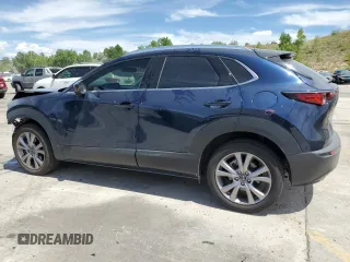 2022 Mazda CX-30 S Premium with VIN 3MVDMBDL9NM446527, listed as a Copart auction lot 63291275 with 17,035 mi miles and Salvage title. Bid and sale history available at DreamBid. Image 2.