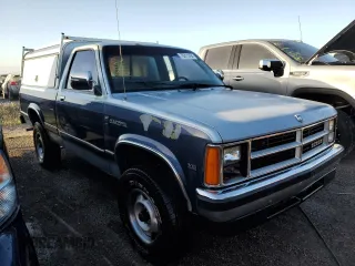 1989 Dodge Dakota z VIN 1B7GG26X9KS021432, wystawiony jako Copart lot #78311494 z przebiegiem 106 224 mil mil oraz Nie do naprawy • Non repairable. Historia ofert i sprzedaży dostępna na DreamBid. Obrazek 4.