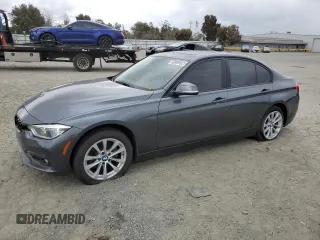 2018 BMW 3 Series 320i with VIN WBA8E1G59JNU88913, listed as a Copart auction lot 50989025 with 0 mi miles and Salvage Title. Bid and sale history available at carsss.com. Image 1.