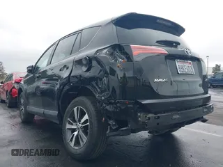 2018 Toyota RAV4 XLE with VIN 2T3WFREV3JW516867, listed as a IAAI auction lot 41765369 with 54,390 mi miles. Bid and sale history available at carsss.com. Image 6.