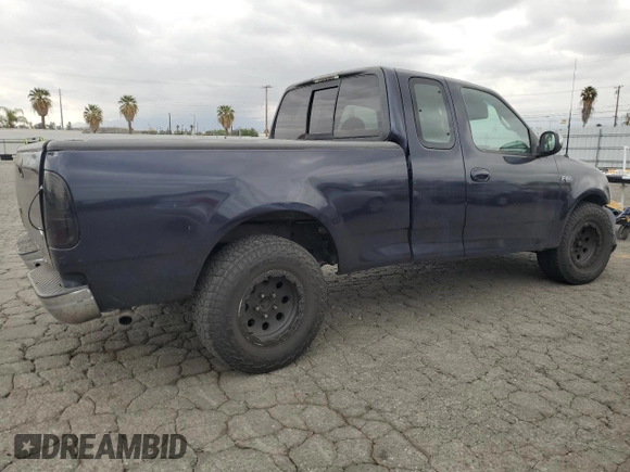 2000 Ford F-150 XL with VIN 1FTZX1721YKB14556, listed as a Copart auction lot 53227925 with 0 mi miles and Salvage Title. Bid and sale history available at carsss.com. Image 3.