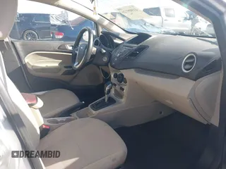 2016 Ford Fiesta SE with VIN 3FADP4BJ6GM205412, listed as a IAAI auction lot 41809126 with 100,941 mi miles. Bid and sale history available at carsss.com. Image 5.