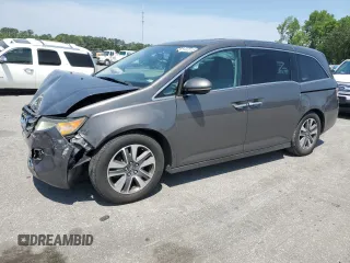 2014 Honda Odyssey Touring with VIN 5FNRL5H93EB061754, listed as a Copart auction lot 55182015 with 168,058 mi miles and Salvage title. Bid and sale history available at DreamBid. Image 1.