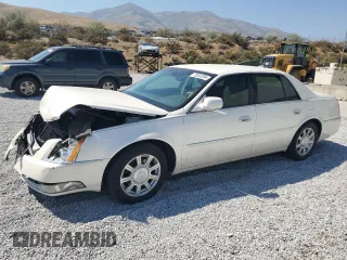 2011 Cadillac DTS with VIN 1G6KA5E68BU102452, listed as a Copart auction lot 70063094 with 66,589 mi miles and Salvage Title. Bid and sale history available at carsss.com. Image 1.