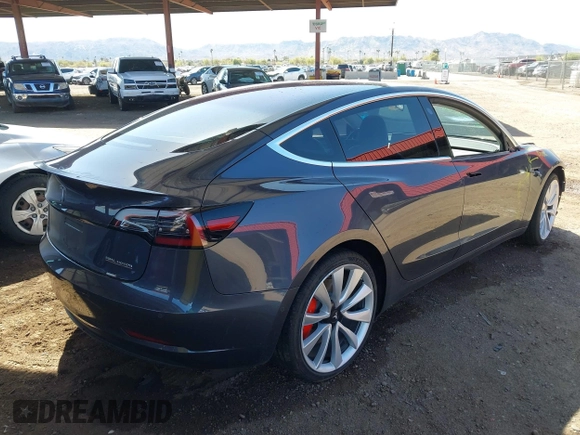 2018 Tesla Model 3 Long Range Battery z VIN 5YJ3E1EB6JF105837, wystawiony jako IAAI lot #41763460 z przebiegiem 100 387 mil mil oraz . Historia ofert i sprzedaży dostępna na DreamBid. Obrazek 4.