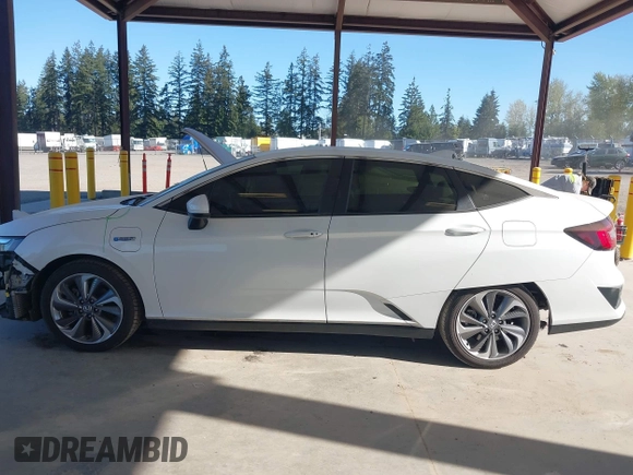 2018 Honda Clarity Plug-In Hybrid Touring with VIN JHMZC5F38JC003207, listed as a IAAI auction lot 42057987 with 35,420 mi miles. Bid and sale history available at carsss.com. Image 15.