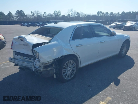 2013 Chrysler 300 Luxury Series with VIN 2C3CCASGXDH573689, listed as a IAAI auction lot 41782712 with 204,746 mi miles and . Bid and sale history available at DreamBid. Image 4.