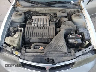 2000 Mitsubishi Diamante LS z VIN 6MMAP67P5YT006608, wystawiony jako Copart lot #49009455 z przebiegiem 241 503 mil mil oraz Tytuł czysty. Historia ofert i sprzedaży dostępna na DreamBid. Obrazek 11.