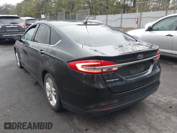 2018 Ford Fusion SE with VIN 3FA6P0H77JR178356, listed as a IAAI auction lot 41970854 with 167,623 mi miles. Bid and sale history available at carsss.com. Image 3.