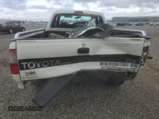 1995 Toyota T100 DX z VIN JT4VD12E5S0002399, wystawiony jako Copart lot #50703005 z przebiegiem 381 083 mil mil oraz Szkody całkowita. Historia ofert i sprzedaży dostępna na DreamBid. Obrazek 6.