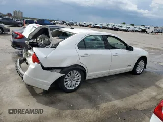 2010 Ford Fusion Hybrid z VIN 3FADP0L34AR186085, wystawiony jako Copart lot #55291735 z przebiegiem 282 029 mil mil oraz Szkody całkowita. Historia ofert i sprzedaży dostępna na DreamBid. Obrazek 3.