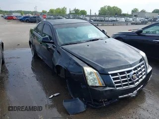 2013 Cadillac CTS Luxury z VIN 1G6DG5E56D0115726, wystawiony jako IAAI lot #41996717 z przebiegiem 216 011 mil mil oraz . Historia ofert i sprzedaży dostępna na DreamBid. Obrazek 1.