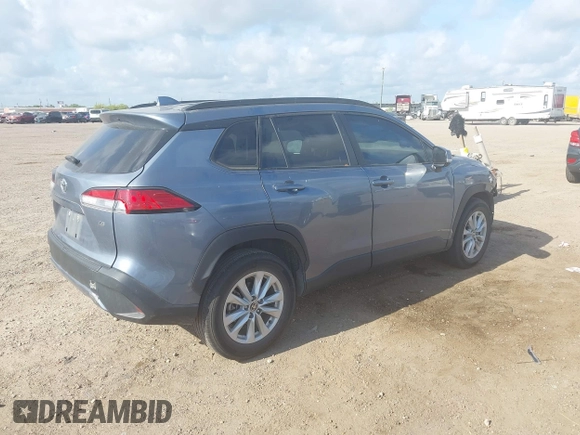 2022 Toyota Corolla Cross LE with VIN 7MUCAAAG0NV018245, listed as a IAAI auction lot 42039762 with 26,690 mi miles and . Bid and sale history available at DreamBid. Image 4.