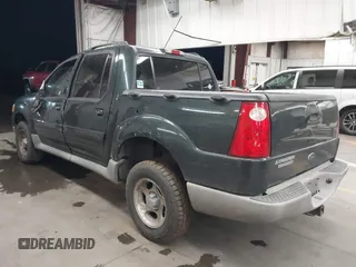 2003 Ford Explorer Sport Trac XLS z VIN 1FMZU77E73UB07352, wystawiony jako IAAI lot #41803900 z przebiegiem 153 433 mil mil oraz . Historia ofert i sprzedaży dostępna na DreamBid. Obrazek 3.