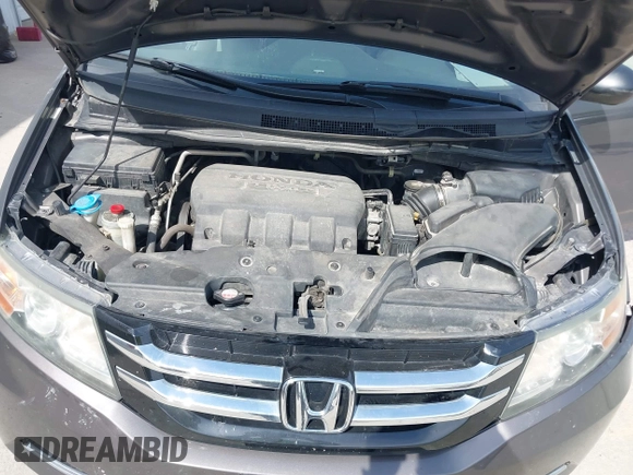 2014 Honda Odyssey EX-L with VIN 5FNRL5H67EB106183, listed as a IAAI auction lot 42210600 with 196,166 mi miles and . Bid and sale history available at DreamBid. Image 10.