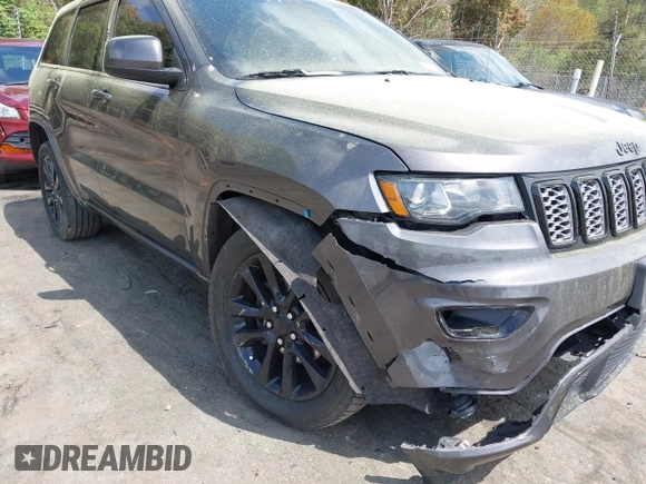 2019 Jeep Grand Cherokee Altitude with VIN 1C4RJFAG5KC854048, listed as a IAAI auction lot 41955935 with 93,972 mi miles and . Bid and sale history available at DreamBid. Image 6.