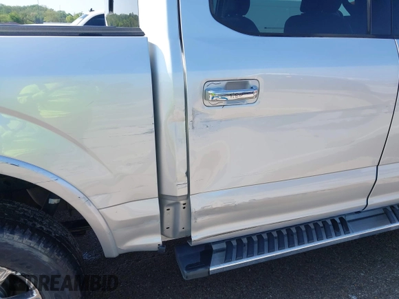 2015 Ford F-150 XLT with VIN 1FTEW1EG8FKE61864, listed as a IAAI auction lot 42120436 with 129,448 mi miles and . Bid and sale history available at DreamBid. Image 6.