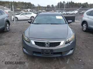 2009 Honda Accord LX-S with VIN 1HGCS12349A019583, listed as a IAAI auction lot 41146922 with 135,656 mi miles and . Bid and sale history available at DreamBid. Image 12.