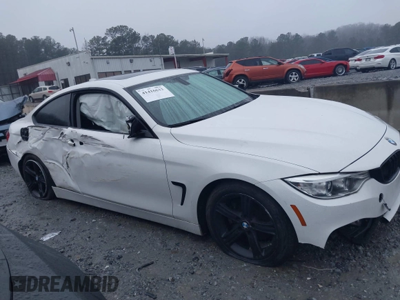 2014 BMW 4 Series 428i with VIN WBA3N7C52EF718794, listed as a IAAI auction lot 41416632 with 179,681 mi miles and . Bid and sale history available at carsss.com. Image 13.