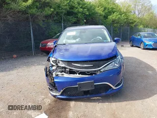2020 Chrysler Pacifica Touring with VIN 2C4RC1FGXLR185354, listed as a IAAI auction lot 42093302 with 117,932 mi miles and . Bid and sale history available at DreamBid. Image 13.