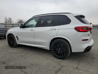 2020 BMW X5 M50i with VIN 5UXJU4C00LL228142, listed as a Copart auction lot 81246294 with 86,014 mi miles and Clean Title. Bid and sale history available at DreamBid. Image 2.