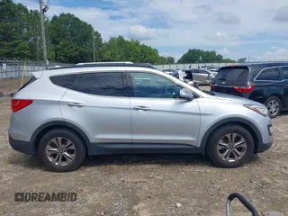 2016 Hyundai Santa Fe z VIN 5XYZU3LB3GG341634, wystawiony jako IAAI lot #42690921 z przebiegiem 149 571 mil mil oraz . Historia ofert i sprzedaży dostępna na DreamBid. Obrazek 13.